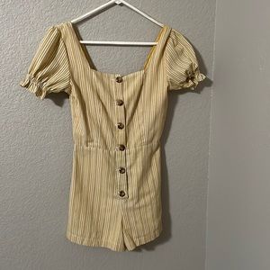 Mustard yellow and white romper from Francesca’s XS